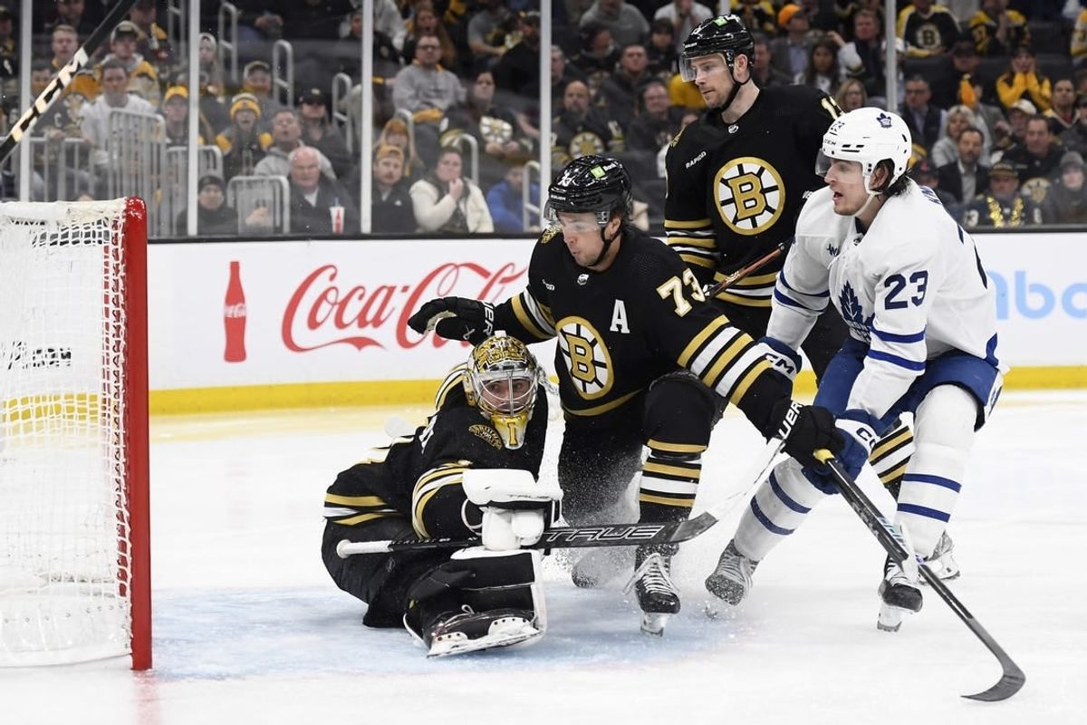 Apr 30, 2024; Boston, Massachusetts, USA; Toronto Maple Leafs left wing Matthew Knies (23) scores the game winning goal past Boston Bruins goaltender Jeremy Swayman (1) during overtime in game five of the first round of the 2024 Stanley Cup Playoffs at TD Garden.