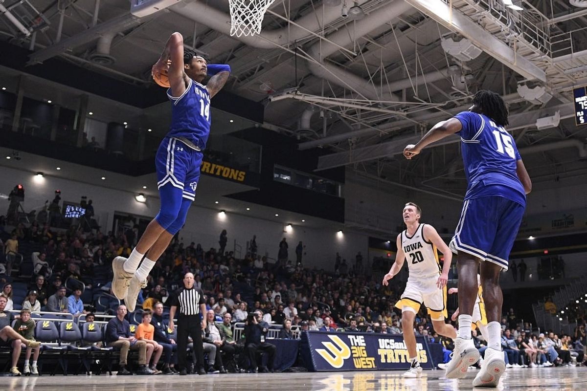Nov 24, 2023; La Jolla, California, USA; Seton Hall Pirates guard Dre Davis (14) dunks the ball during the second half against the Iowa Hawkeyes at LionTree Arena.