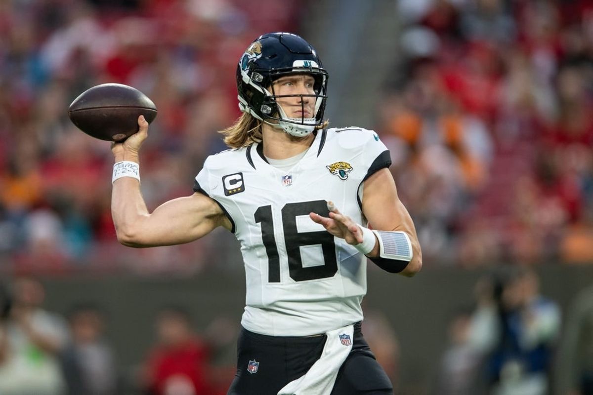 Dec 24, 2023; Tampa, Florida, USA; Jacksonville Jaguars quarterback Trevor Lawrence (16) throws the ball against the Tampa Bay Buccaneers in the second quarter at Raymond James Stadium.