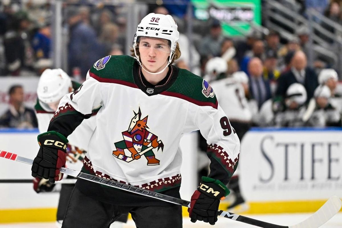 Oct 19, 2023; St. Louis, Missouri, USA;  Arizona Coyotes center Logan Cooley (92) waits for a face off against the St. Louis Blues during the first period at Enterprise Center.
