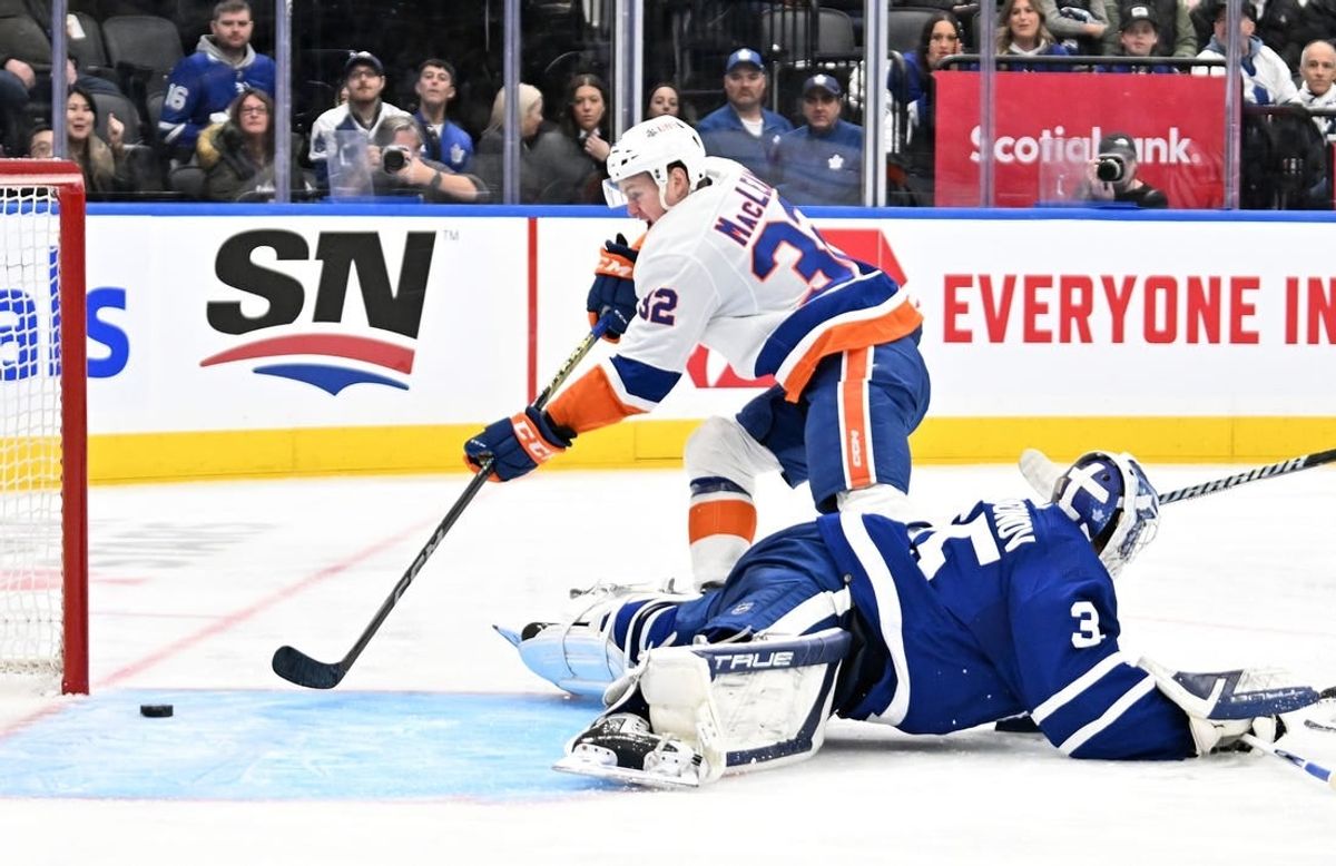 Feb 5, 2024; Toronto, Ontario, CAN;   New York Islanders forward Kyle MacLean (32) scores a goal past Toronto Maple Leafs goalie Ilya Samsonov (35) in the second period at Scotiabank Arena.