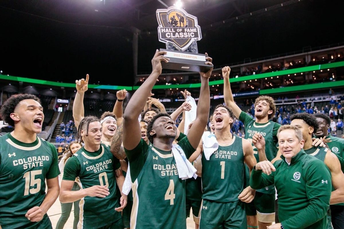 Nov 23, 2023; Kansas City, Missouri, USA; against the Colorado State Rams hold up the championship trophy after the game against the Creighton Bluejays at T-Mobile Center.