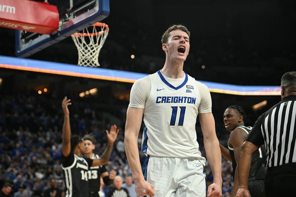 Jan 6, 2024; Omaha, Nebraska, USA; Creighton Bluejays center Ryan Kalkbrenner (11) reacts after scoring and being fouled against the Providence Friars in the second half at CHI Health Center Omaha.