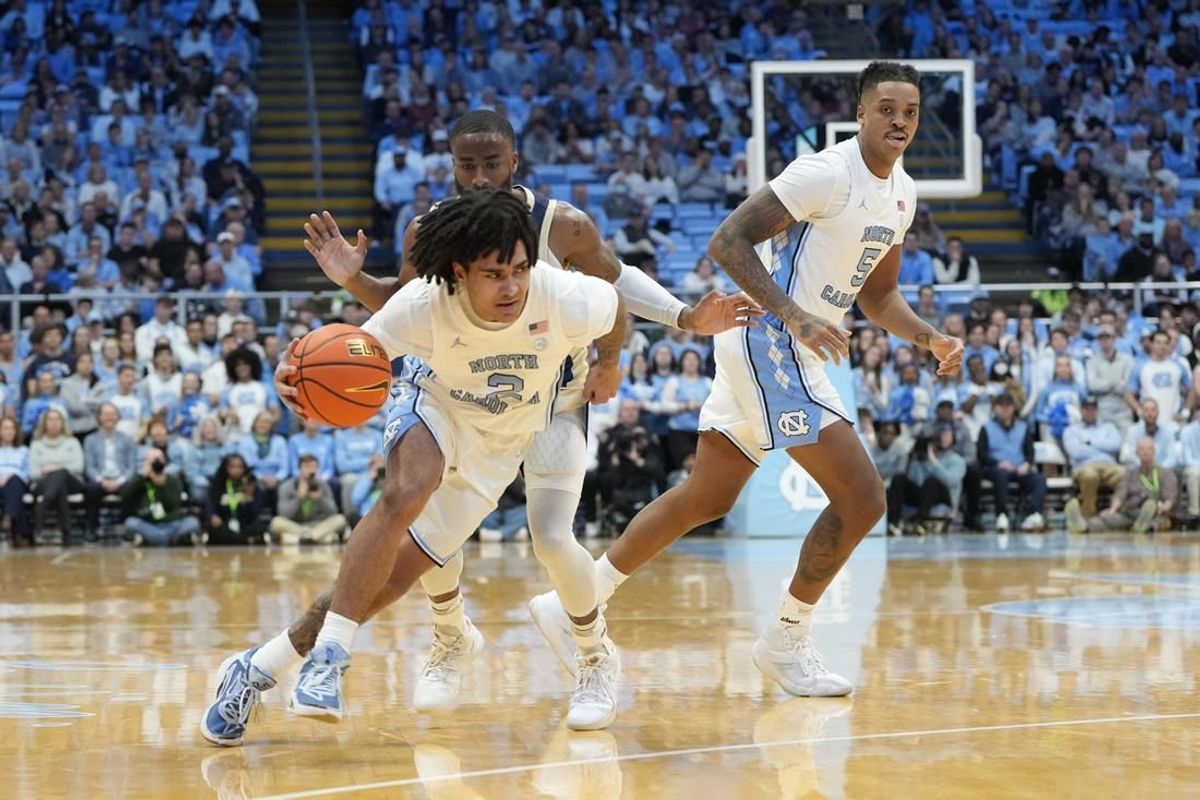 Dec 29, 2023; Chapel Hill, North Carolina, USA; North Carolina Tar Heels guard Elliot Cadeau (2) dribbles in the first half at Dean E. Smith Center.