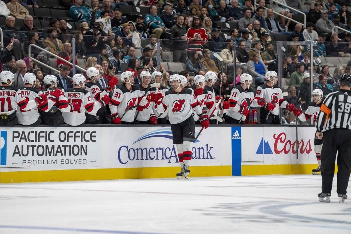 Feb 27, 2024; San Jose, California, USA;  New Jersey Devils defenseman Kevin Bahl (88) celebrates with teammates after the goal during the second period against the San Jose Sharks at SAP Center at San Jose.
