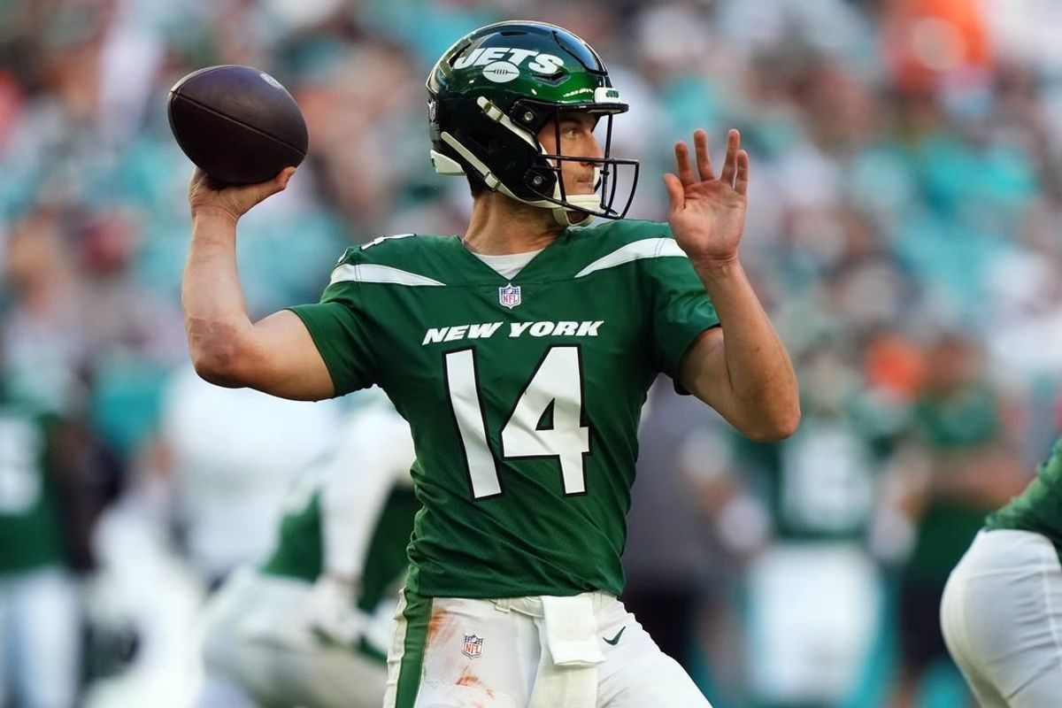 Dec 17, 2023; Miami Gardens, Florida, USA; New York Jets quarterback Trevor Siemian (14) attempts a pass against the Miami Dolphins during the second half at Hard Rock Stadium.