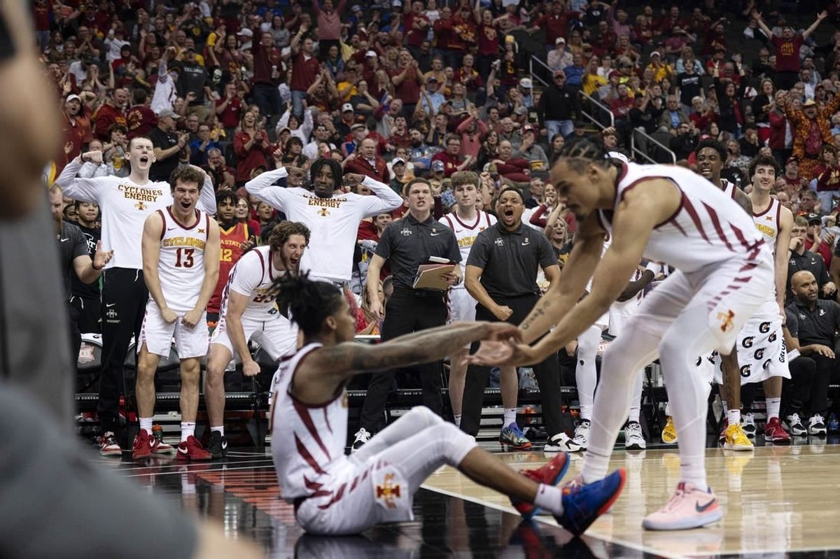 Mar 15, 2024; Kansas City, MO, USA; The Iowa State Cyclones bench celebrates a made basket against the Baylor Bears in the second half at T-Mobile Center.