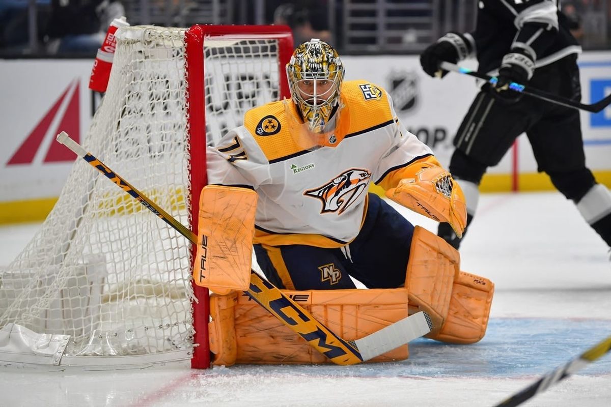 Feb 22, 2024; Los Angeles, California, USA; Nashville Predators goaltender Juuse Saros (74) defends the goal against the Los Angeles Kings during the second period at Crypto.com Arena.