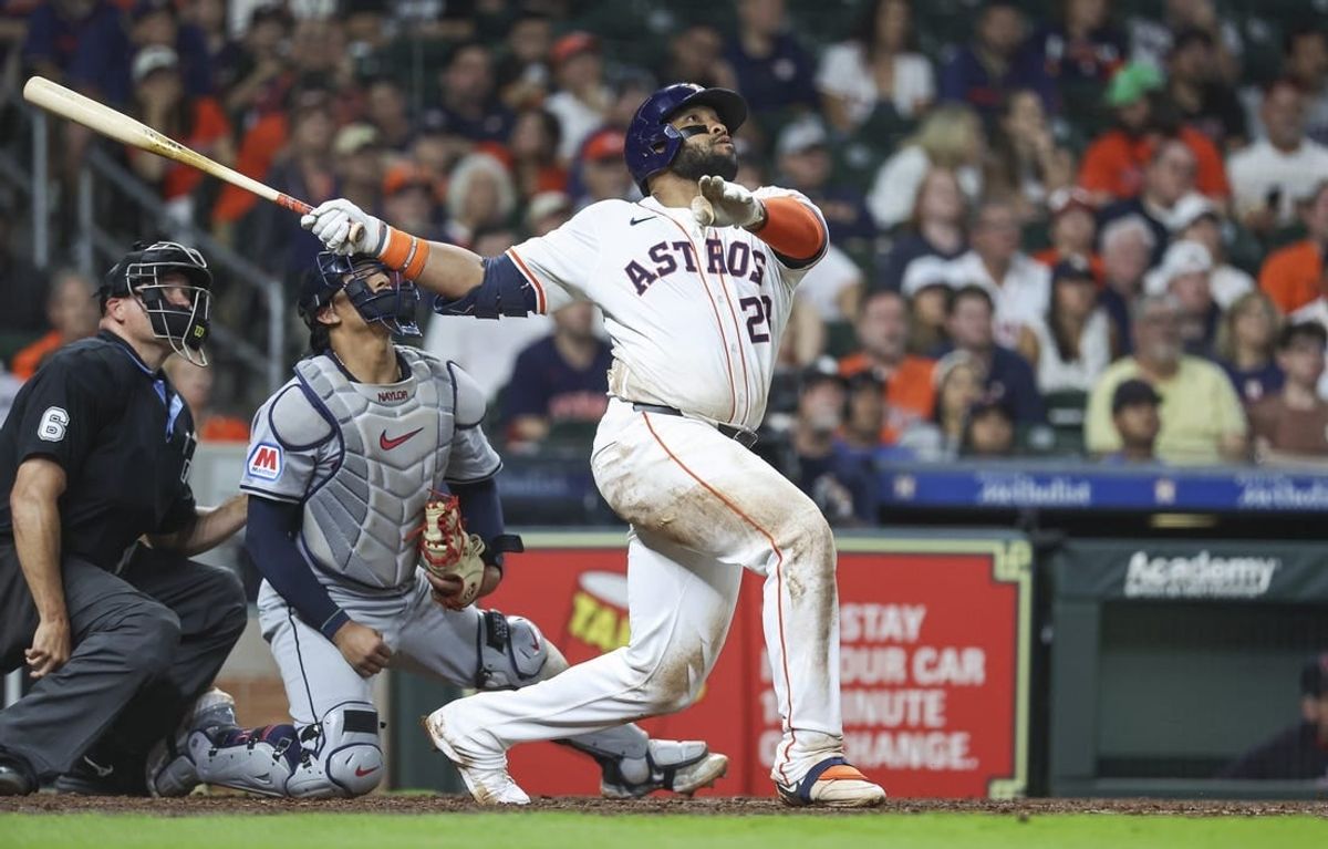 May 2, 2024; Houston, Texas, USA; Houston Astros first baseman Jon Singleton (28) hits a home run during the sixth inning against the Cleveland Guardians at Minute Maid Park.