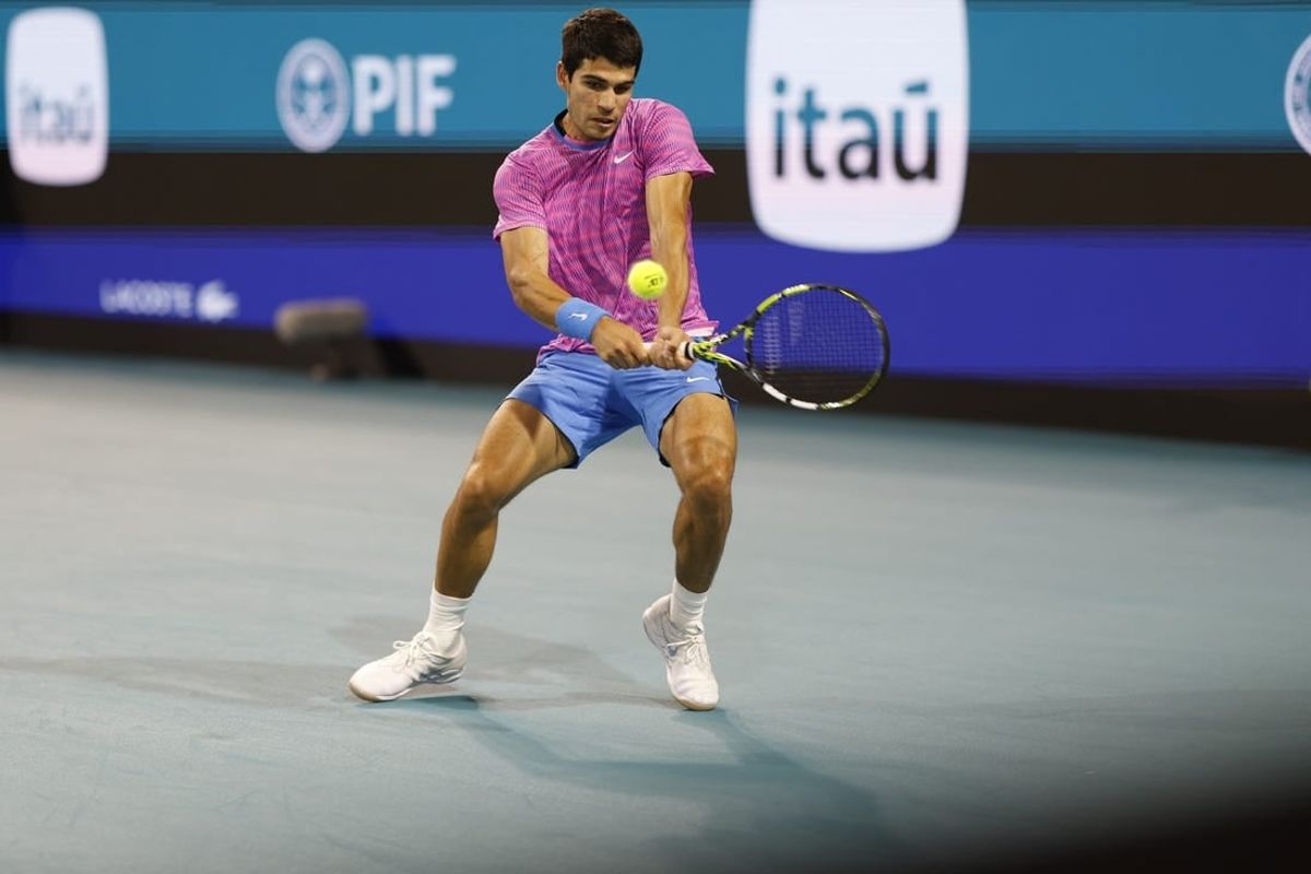 Mar 28, 2024; Miami Gardens, FL, USA; Carlos Alcaraz (ESP) hits a backhand against Grigor Dmitrov (BUL) (not pictured) on day eleven of the Miami Open at Hard Rock Stadium.