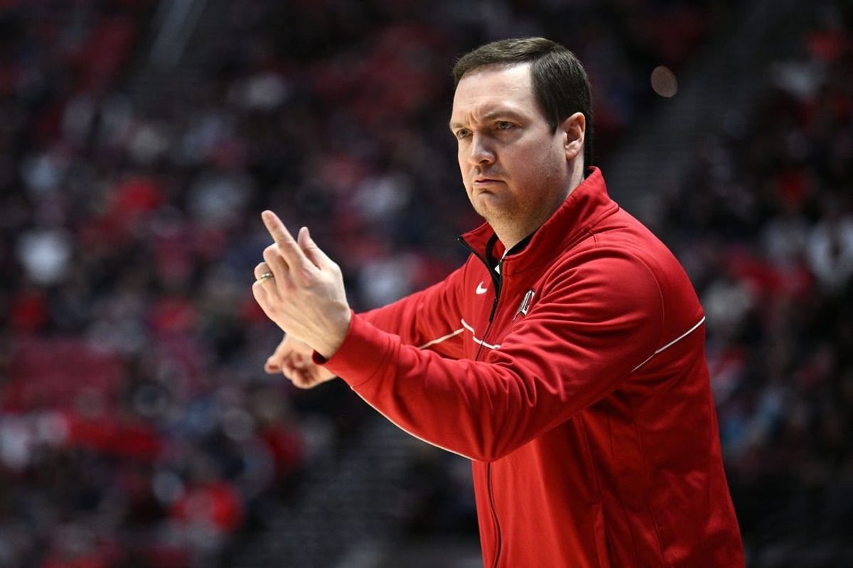 Feb 11, 2023; San Diego, California, USA; UNLV Rebels head coach Kevin Kruger gestures during the first half against the San Diego State Aztecs at Viejas Arena.
