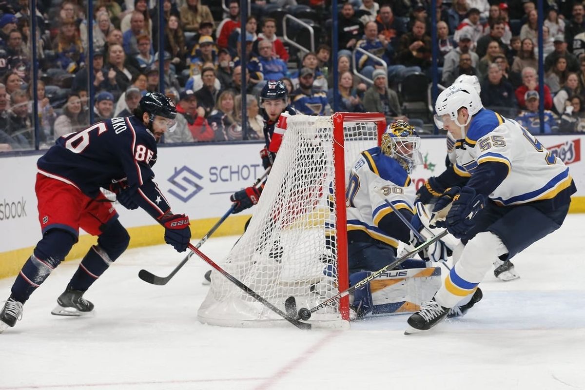 Dec 8, 2023; Columbus, Ohio, USA; St. Louis Blues defenseman Colton Parayko (55) stops the wraparound shot from Columbus Blue Jackets right wing Kirill Marchenko (86) during the second period at Nationwide Arena.