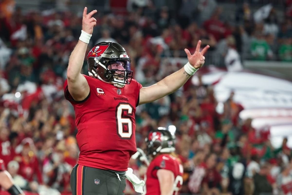 Jan 15, 2024; Tampa, Florida, USA; Tampa Bay Buccaneers quarterback Baker Mayfield (6) celebrates a touchdown against the Philadelphia Eagles during the first half of a 2024 NFC wild card game at Raymond James Stadium.