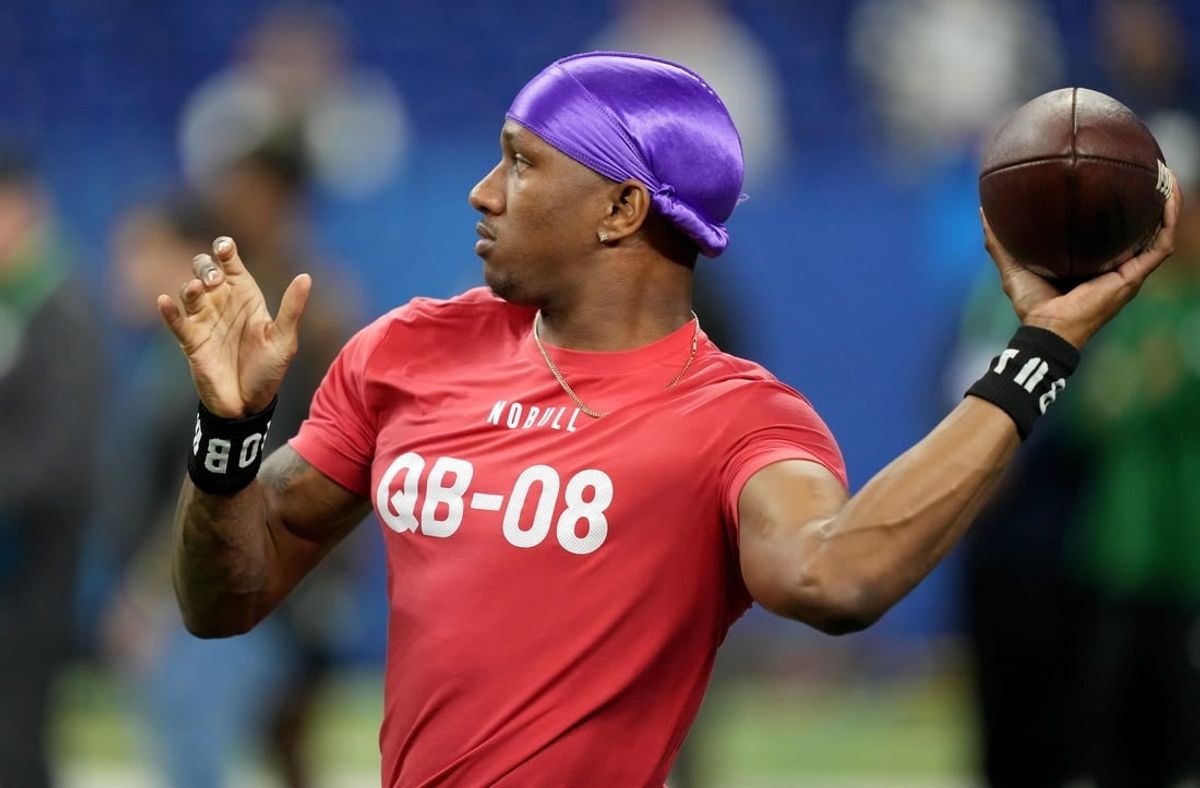 Mar 2, 2024; Indianapolis, IN, USA; Washington quarterback Michael Penix (QB08) during the 2024 NFL Combine at Lucas Oil Stadium.