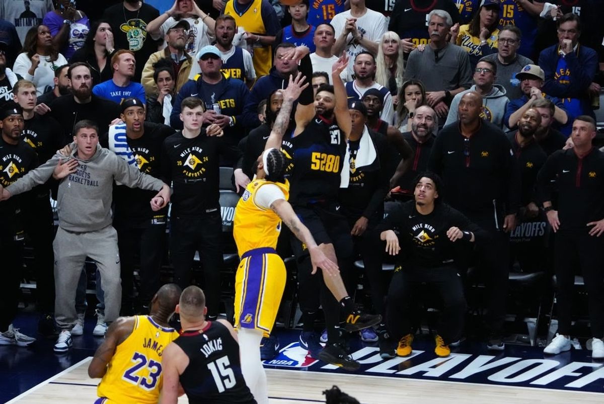 Apr 22, 2024; Denver, Colorado, USA; Denver Nuggets guard Jamal Murray (27) shoots over Los Angeles Lakers forward Anthony Davis (3) in the fourth quarter during game two during the 2024 NBA playoffs at Ball Arena.
