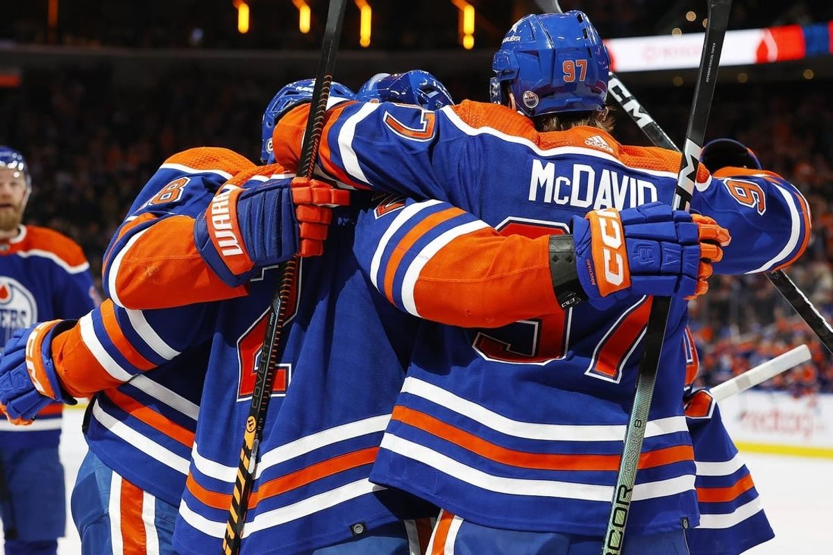 Dec 8, 2023; Edmonton, Alberta, CAN; The Edmonton Oilers celebrate a goal scored by defensemen Evan Bouchard (2) during the first period against the Minnesota Wild at Rogers Place.