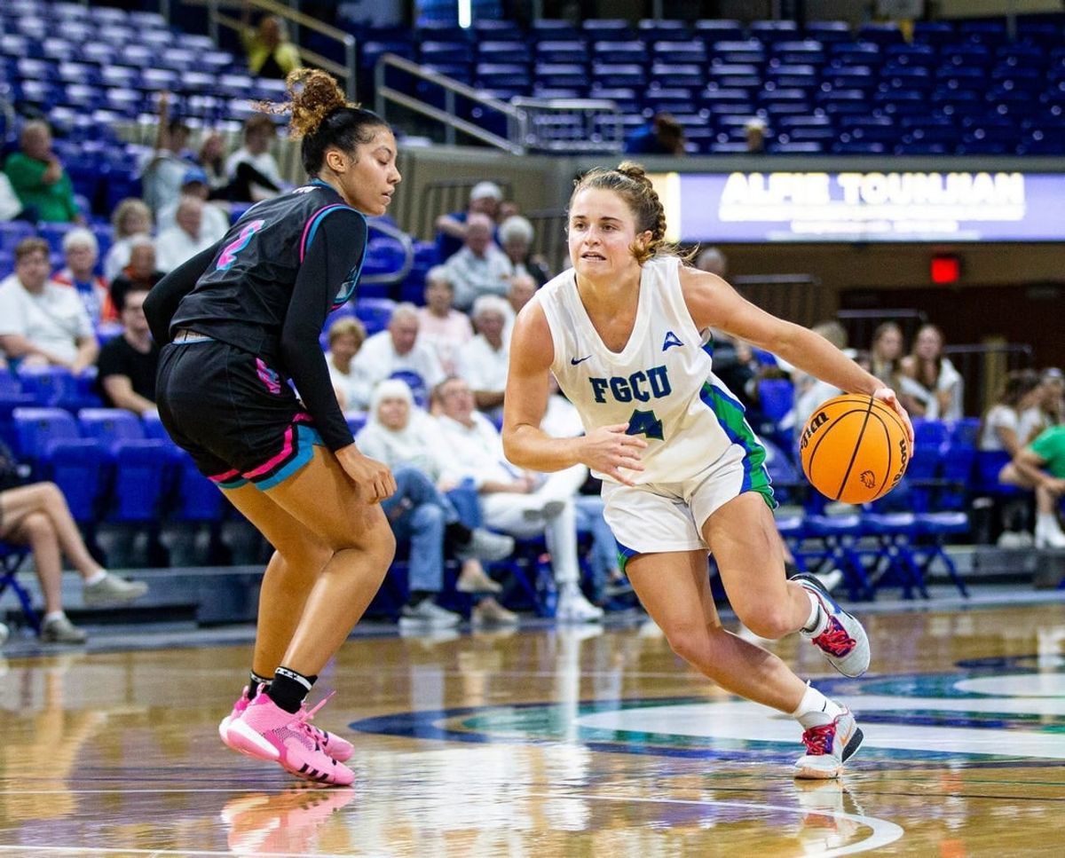 Dolly Cairns #4 of the Florida Gulf Coast University women  s basketball team drives to the basket in a win over Florida International University at FGCU on Tuesday, Nov. 14, 2023.