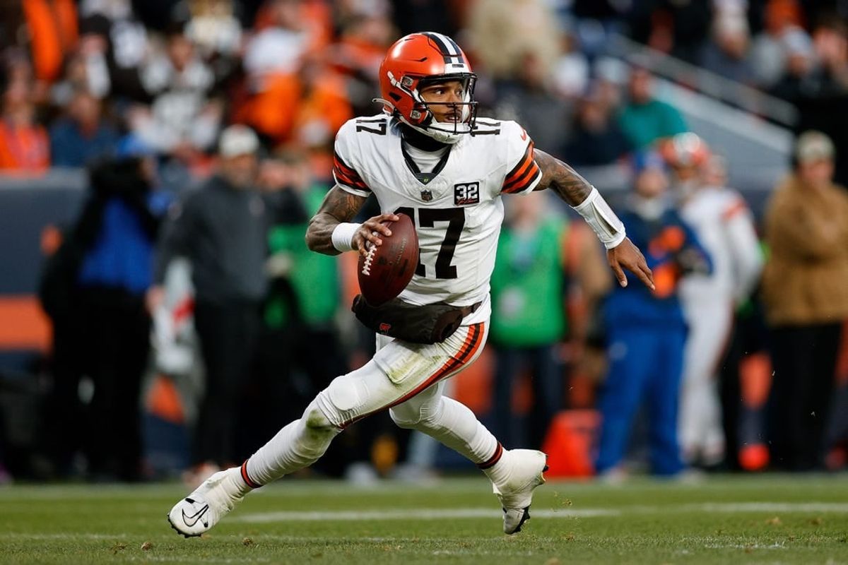 Nov 26, 2023; Denver, Colorado, USA; Cleveland Browns quarterback Dorian Thompson-Robinson (17) scrambles in the backfield in the third quarter against the Denver Broncos at Empower Field at Mile High.
