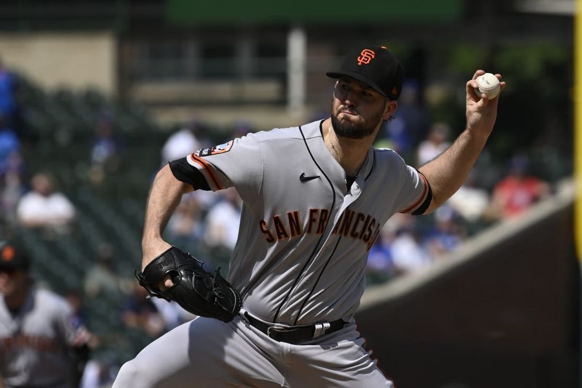 Sep 6, 2023; Chicago, Illinois, USA;  San Francisco Giants starting pitcher Alex Wood (57) delivers a pitch against the Chicago Cubs during the first inning at Wrigley Field.