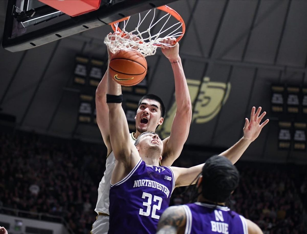 Jan 31, 2024; West Lafayette, Indiana, USA; Purdue Boilermakers center Zach Edey (15) dunks the ball on Northwestern Wildcats forward Blake Preston (32) during the second half at Mackey Arena.