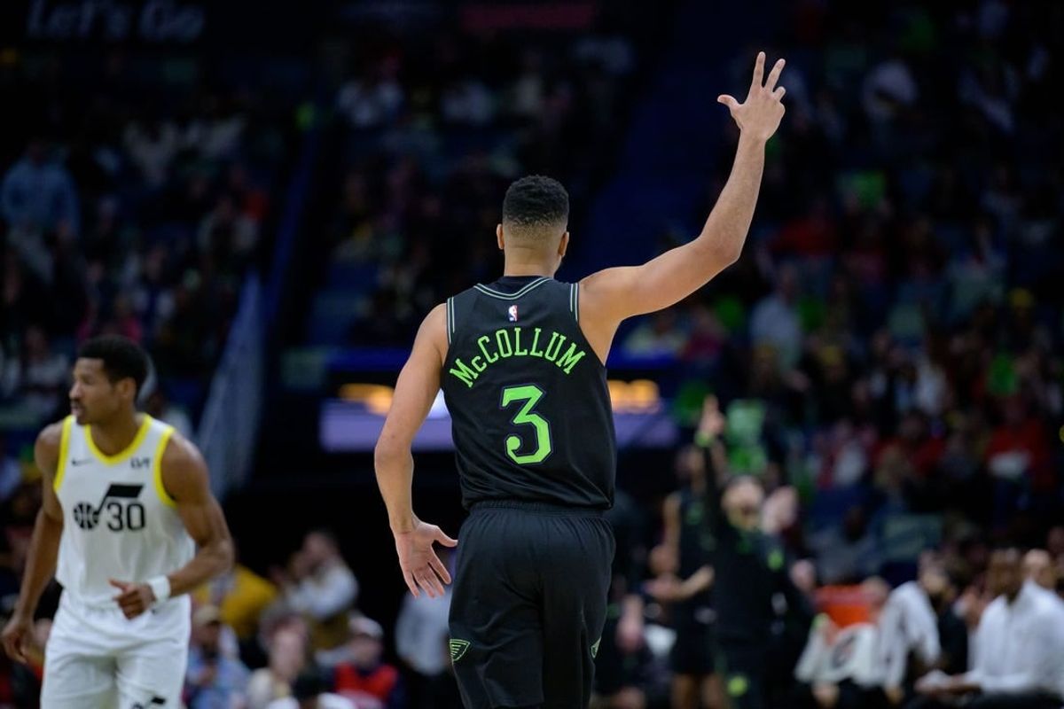 Jan 23, 2024; New Orleans, Louisiana, USA; New Orleans Pelicans guard CJ McCollum (3) celebrates a three-point basket against the Utah Jazz during the second half at Smoothie King Center.