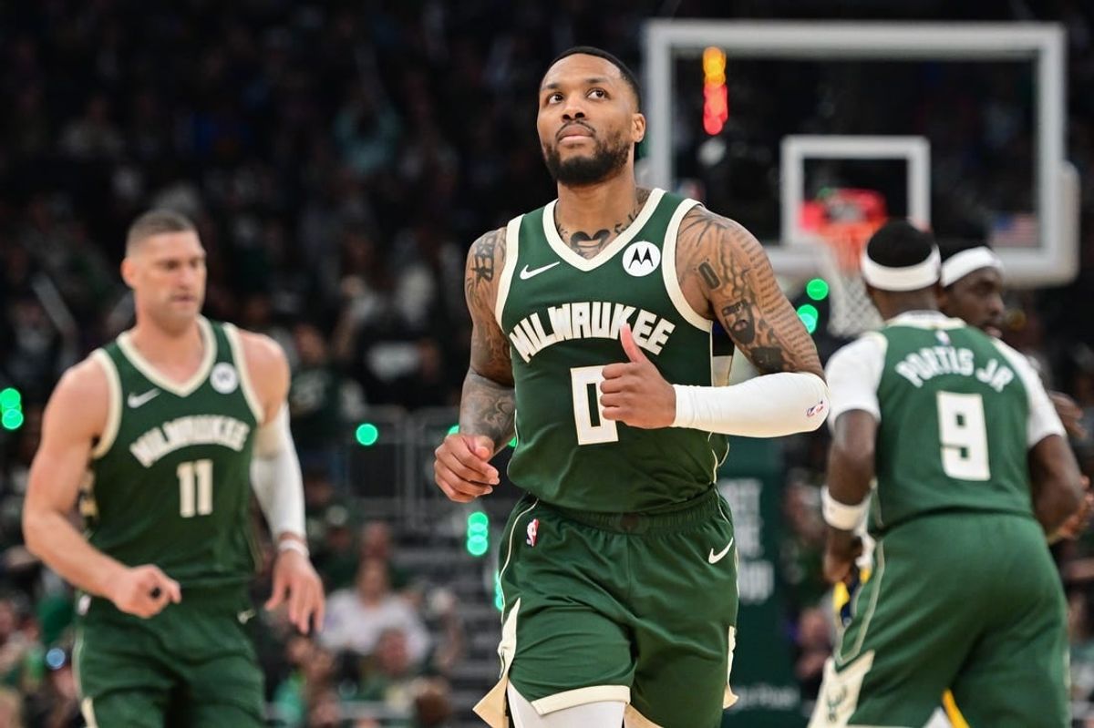 Apr 21, 2024; Milwaukee, Wisconsin, USA; Milwaukee Bucks guard Damian Lillard (0) looks on in the second quarter against the Indiana Pacers during game one of the first round for the 2024 NBA playoffs at Fiserv Forum.