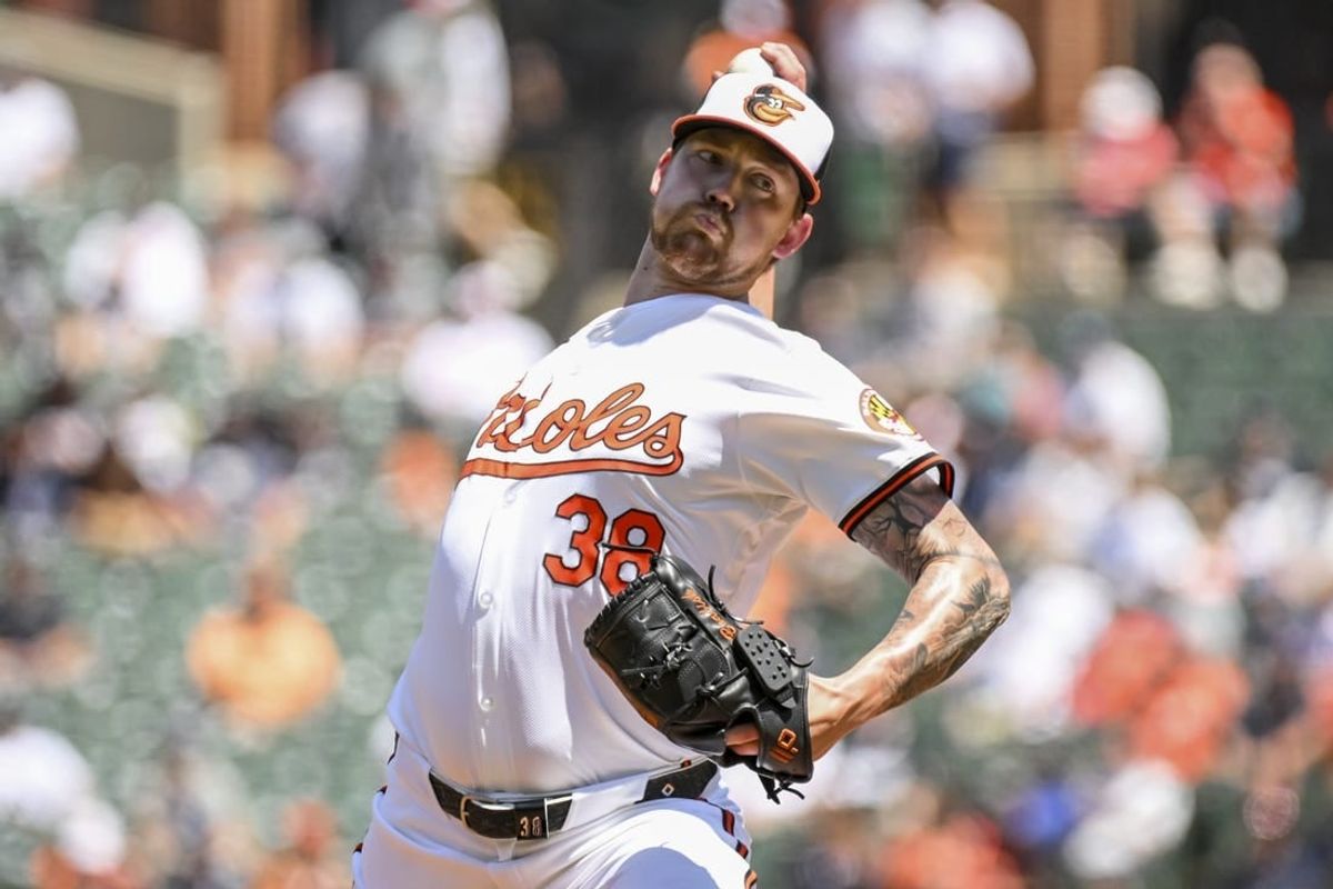 May 2, 2024; Baltimore, Maryland, USA;  Baltimore Orioles starting pitcher Kyle Bradish (38) delivers a first inning pitch against the New York Yankees at Oriole Park at Camden Yards.