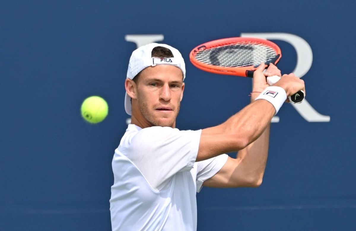 Aug 5, 2023; Toronto, Ontario, Canada;  Diego Schwartzman (ARG) plays a shot against Liam Draxl (CAN) during qualifying play for the National Bank Open at Sobeys Stadium.