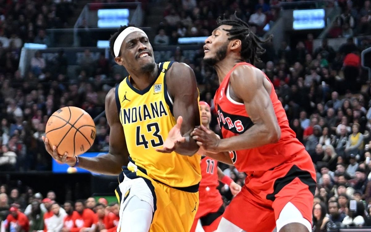 Feb 14, 2024; Toronto, Ontario, CAN;  Indiana Pacers forward Pascal Siakam (43) drives to the basket against Toronto Raptors guard Immanuel Quickley (5) in the first half at Scotiabank Arena.