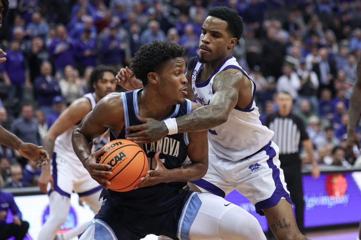 Mar 6, 2024; Newark, New Jersey, USA; Villanova Wildcats guard Jordan Longino (15) is guarded by Seton Hall Pirates guard Al-Amir Dawes (2) during the first half at Prudential Center.