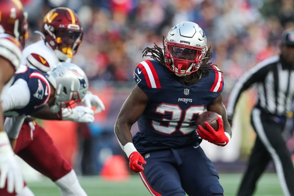 Nov 5, 2023; Foxborough, Massachusetts, USA; New England Patriots running back Rhamondre Stevenson (38) runs the ball during the second half against the Washington Commanders at Gillette Stadium.