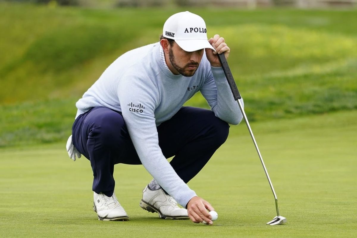 Feb 3, 2024; Pebble Beach, California, USA; Patrick Cantlay lines up his putt on the fifth hole during the third round of the AT&T Pebble Beach Pro-Am golf tournament at Pebble Beach Golf Links.