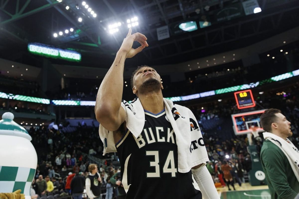 Dec 19, 2023; Milwaukee, Wisconsin, USA;  Milwaukee Bucks forward Giannis Antetokounmpo (34) celebrates following the game against the San Antonio Spurs at Fiserv Forum.