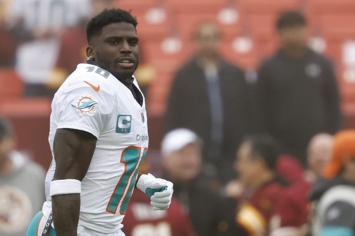 Dec 3, 2023; Landover, Maryland, USA; Miami Dolphins wide receiver Tyreek Hill (10) stands on the field during warm up prior to the game against the Washington Commanders at FedExField.