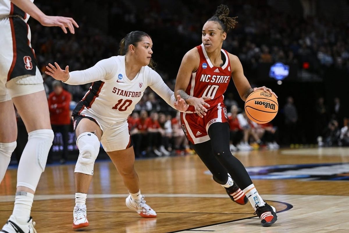 Mar 29, 2024; Portland, OR, USA; NC State Wolfpack guard Aziaha James (10) drives to the basket during the first half against Stanford Cardinal guard Talana Lepolo (10) in the semifinals of the Portland Regional of the 2024 NCAA Tournament at the Moda Center at the Moda Center.