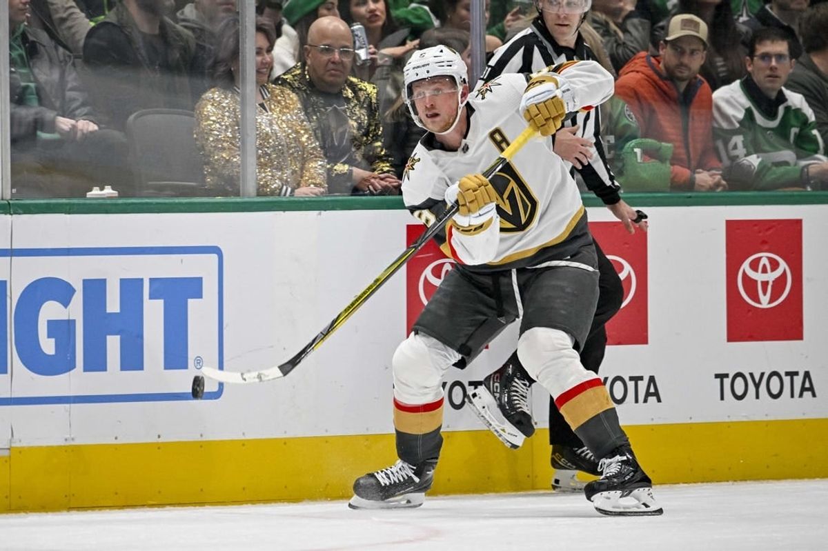 Nov 22, 2023; Dallas, Texas, USA; Vegas Golden Knights center Jack Eichel (9) passes the puck against the Dallas Stars during the third period at the American Airlines Center.