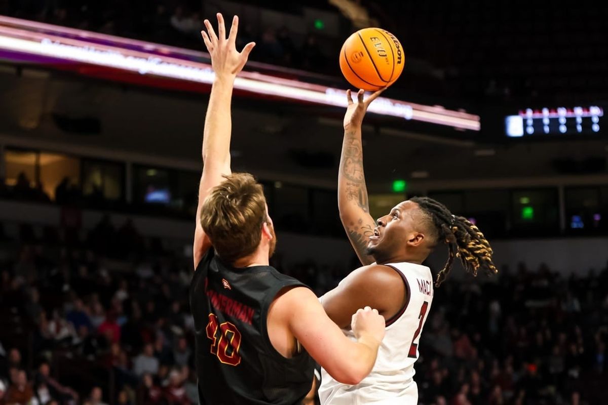 Dec 19, 2023; Columbia, South Carolina, USA; South Carolina Gamecocks forward B.J. Mack (2) shoots over Winthrop Eagles center Alex Timmerman (40) in the first half at Colonial Life Arena.