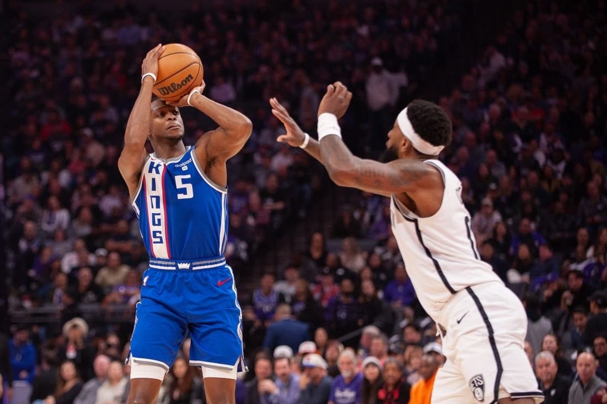 Dec 11, 2023; Sacramento, California, USA; Sacramento Kings guard De'Aaron Fox (5) takes a jump shot during the first quarter at Golden 1 Center.