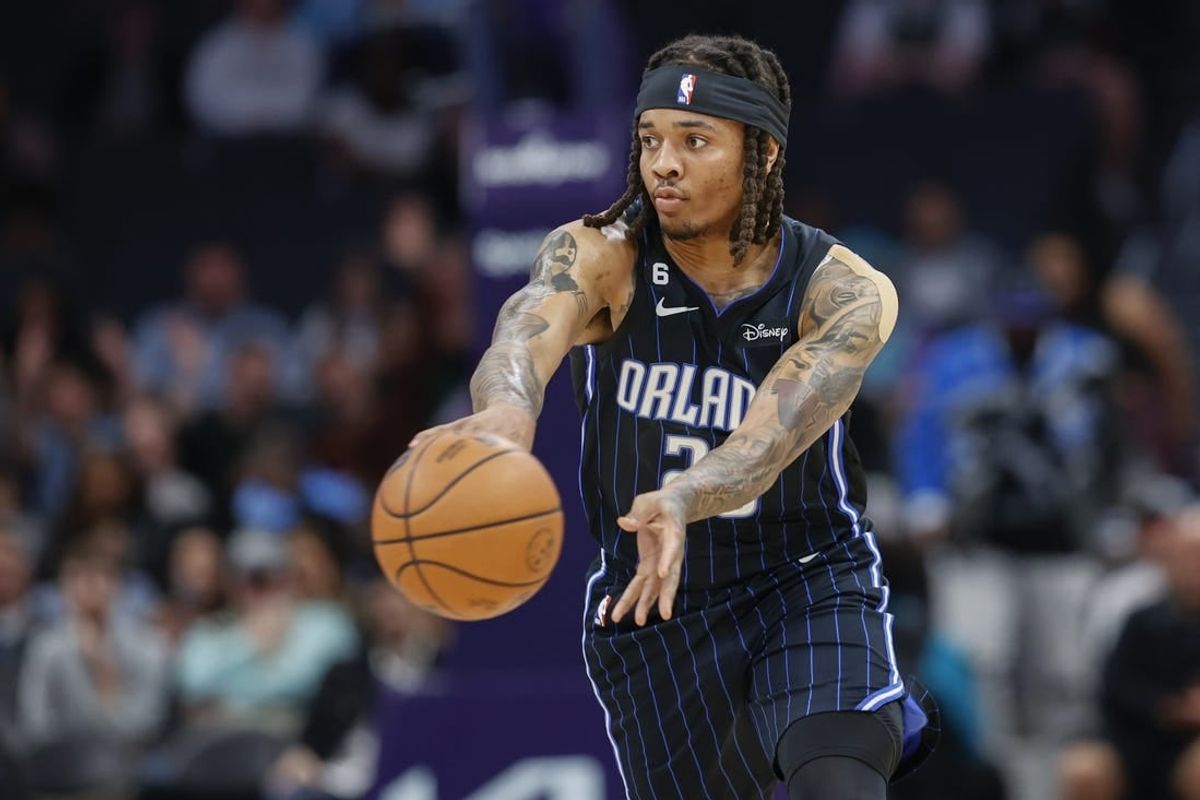 Mar 3, 2023; Charlotte, North Carolina, USA; Orlando Magic guard Markelle Fultz (20) passes against the Charlotte Hornets during the first half at Spectrum Center.