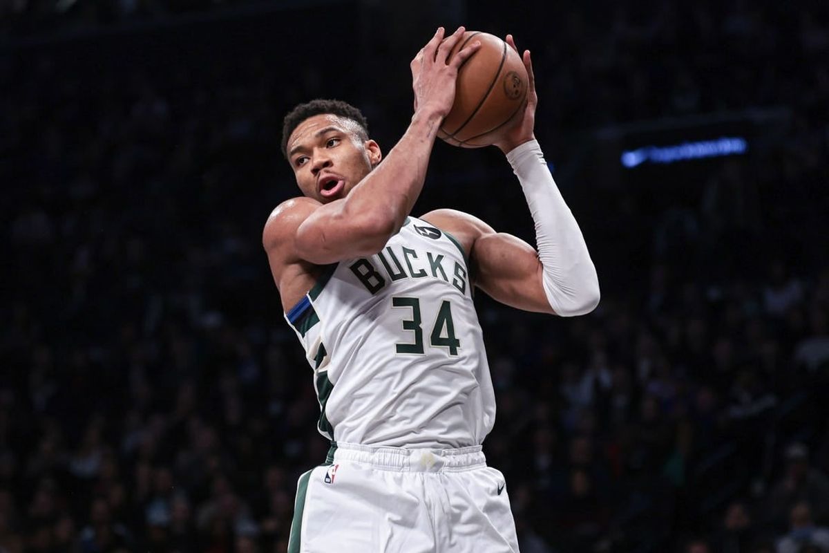 Dec 27, 2023; Brooklyn, New York, USA; Milwaukee Bucks forward Giannis Antetokounmpo (34) rebounds during the first quarter against the Brooklyn Nets at Barclays Center.