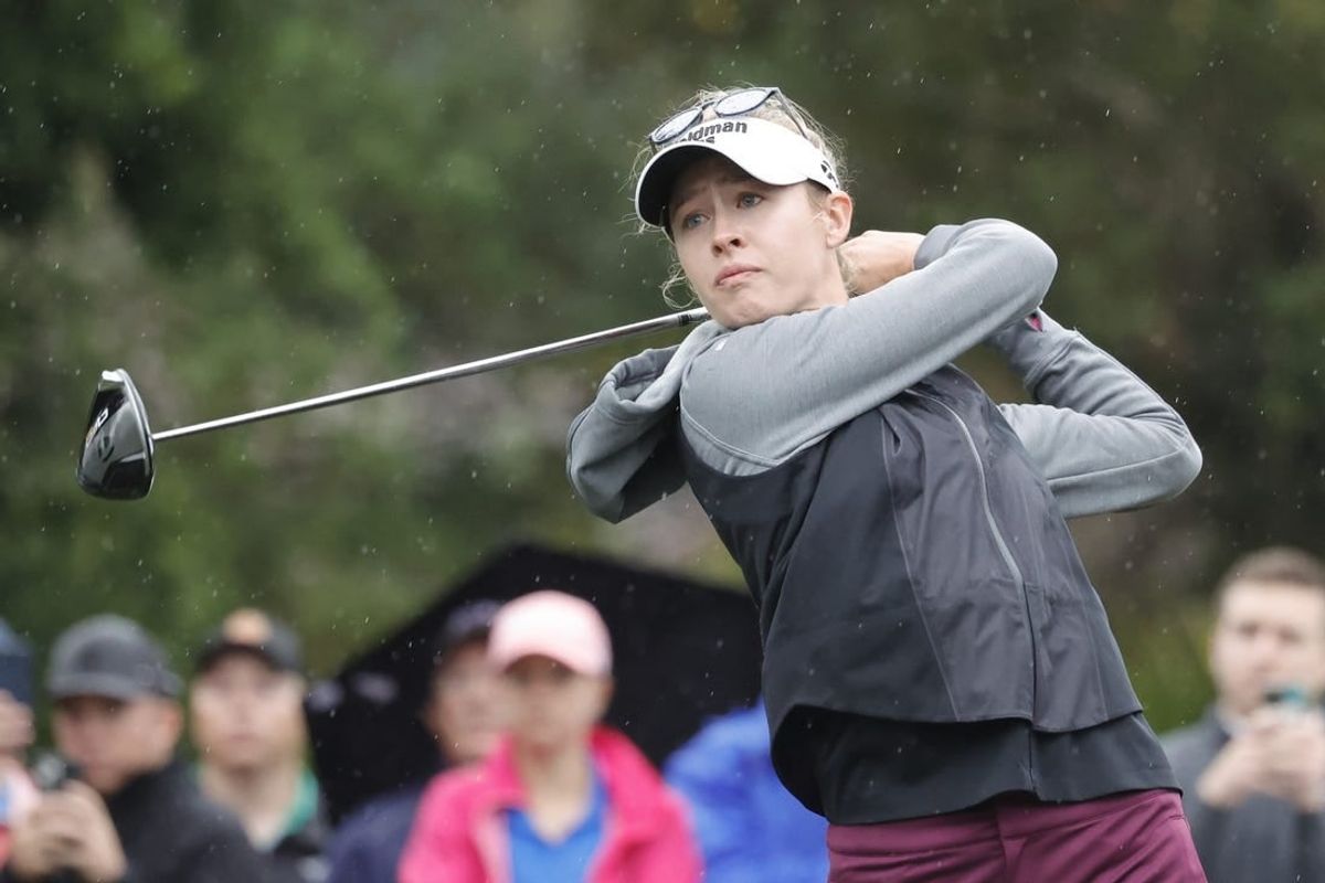 Dec 16, 2023; Orlando, Florida, USA; Nelly Korda plays her shot from the sixth tee during the PNC Championship at The Ritz-Carlton Golf Club.