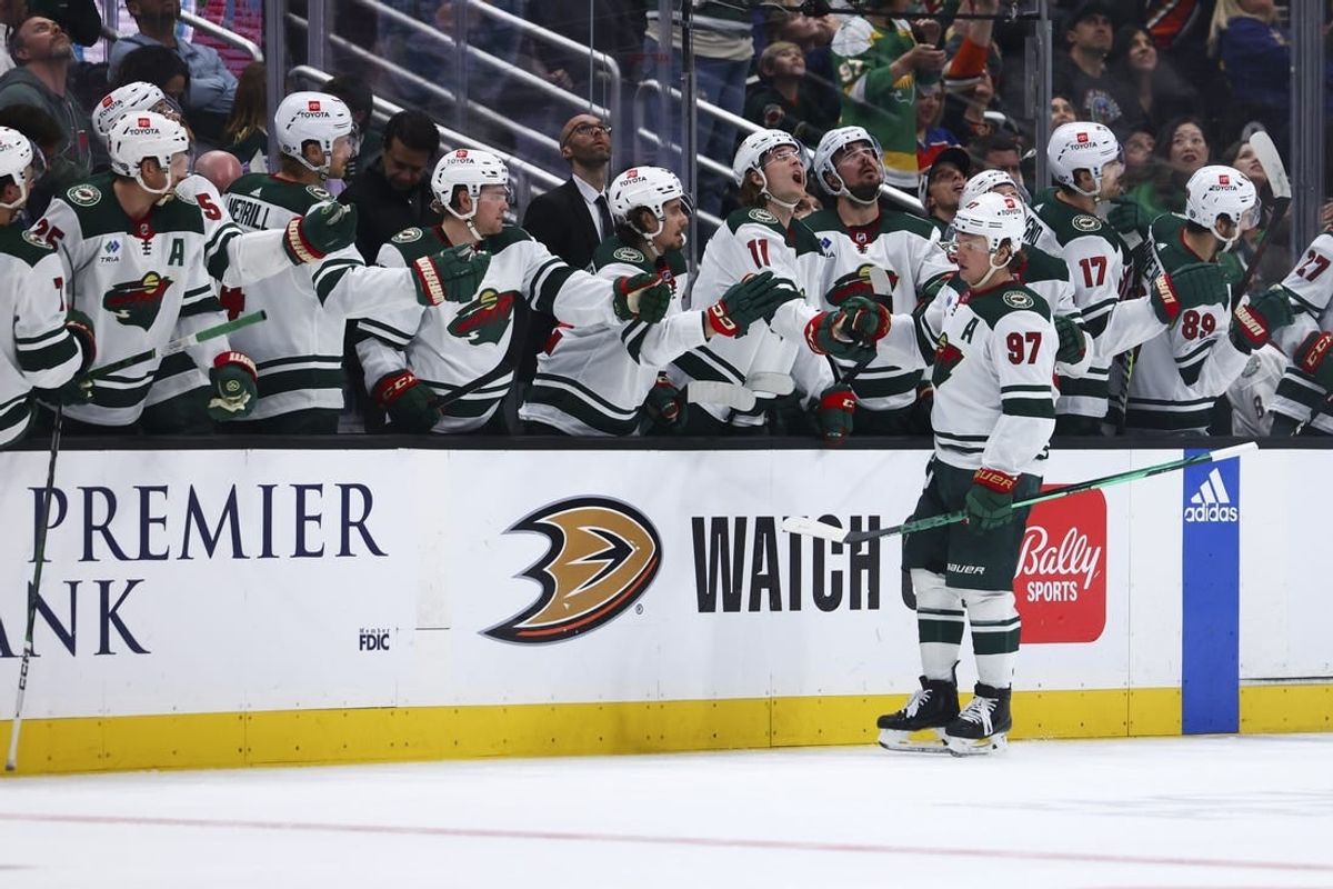 Mar 19, 2024; Anaheim, California, USA; Minnesota Wild left wing Kirill Kaprizov (97) celebrates with his teammates after scoring a goal against the Anaheim Ducks during the second period of a game at Honda Center.