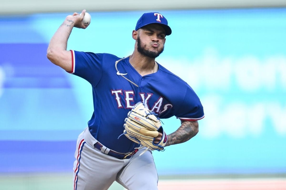 Aug 27, 2023; Minneapolis, Minnesota, USA; Texas Rangers relief pitcher Jonathan Hernandez (72) throws a pitch against the Minnesota Twins during the thirteenth inning at Target Field.