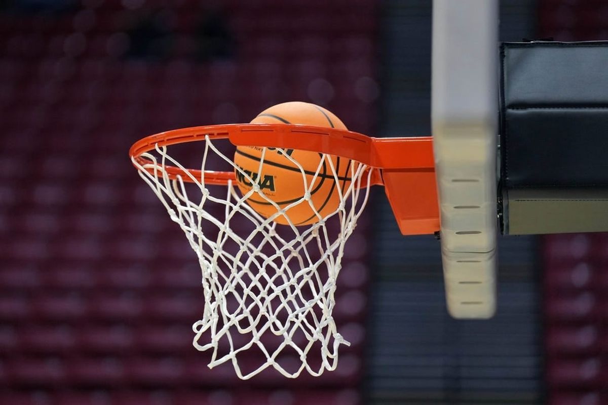 Mar 17, 2022; San Diego, CA, USA; A general view as a basketball goes through the rim and net during practice before the first round of the 2022 NCAA Tournament at Viejas Arena.