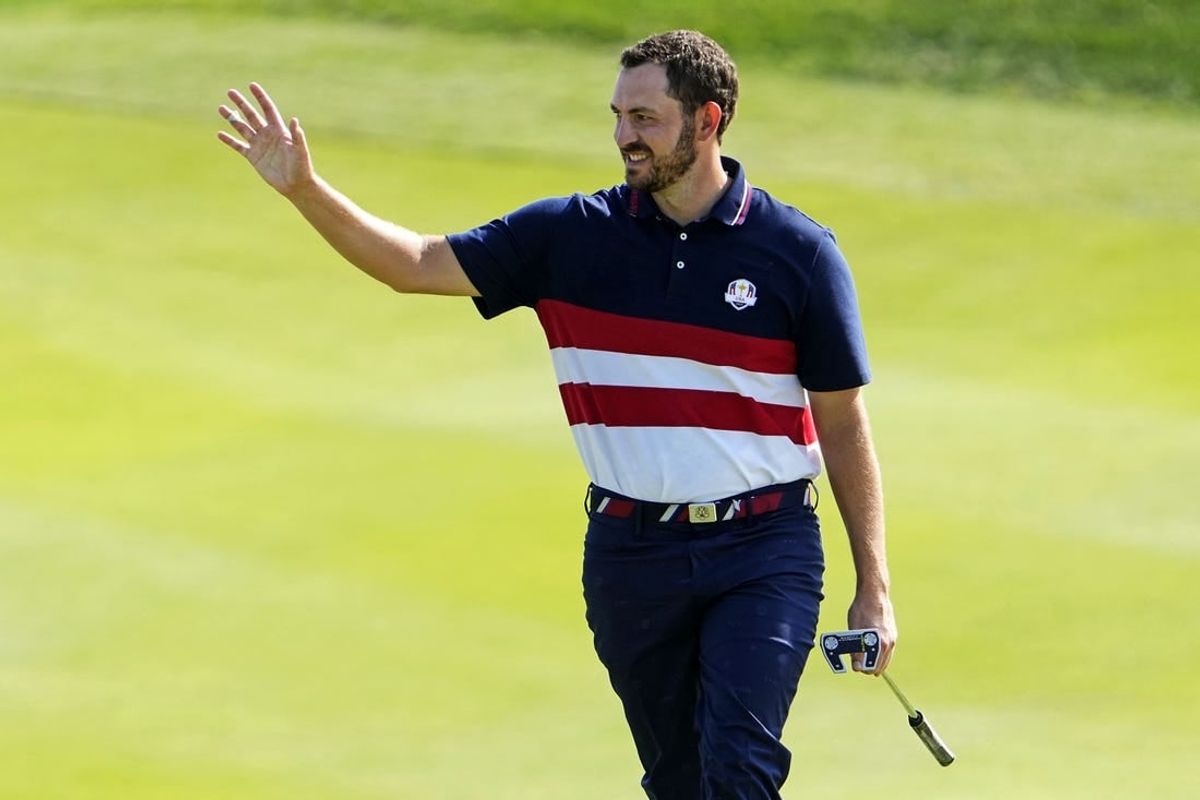 Oct 1, 2023; Rome, ITA; Team USA golfer Patrick Cantlay waves to the gallery on the 12th hole during the final day of the 44th Ryder Cup golf competition at Marco Simone Golf and Country Club.