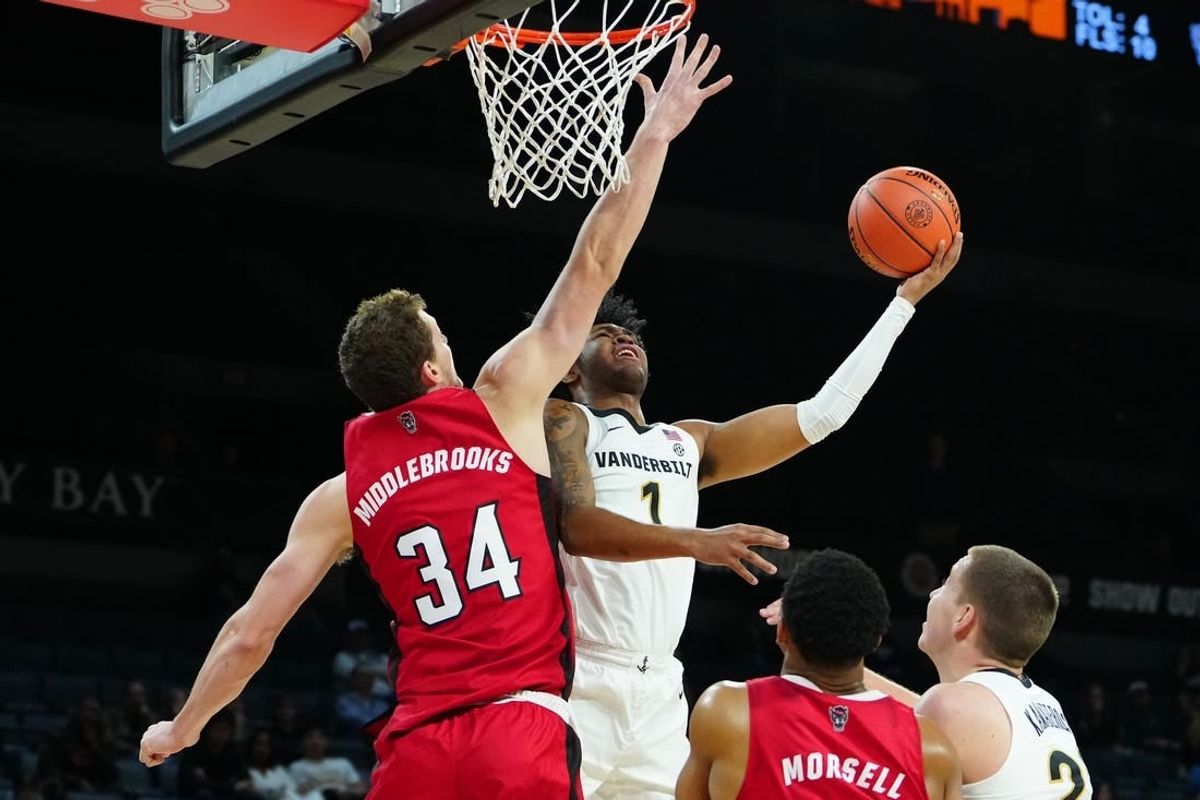 Nov 23, 2023; Las Vegas, Nevada, USA; Vanderbilt Commodores forward Colin Smith (1) shoots against North Carolina State Wolfpack forward Ben Middlebrooks (34) during the first half at Michelob Ultra Arena.