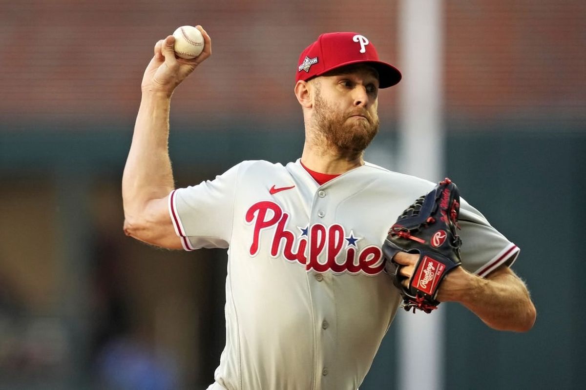 Oct 9, 2023; Cumberland, Georgia, USA; Philadelphia Phillies starting pitcher Zack Wheeler (45) pitches during the first inning against the Atlanta Braves in game two of the NLDS for the 2023 MLB playoffs at Truist Park.