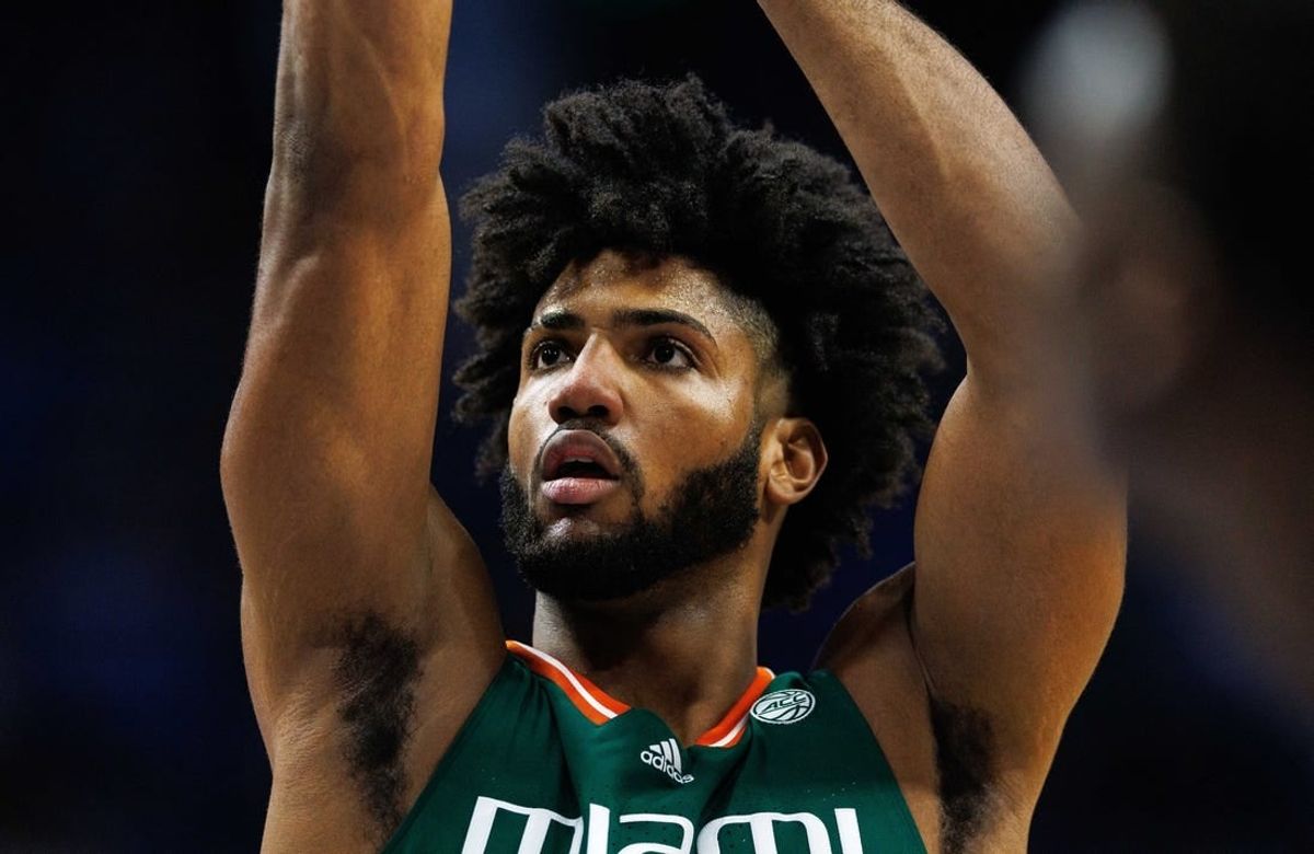 Nov 28, 2023; Lexington, Kentucky, USA; Miami (Fl) Hurricanes forward Norchad Omier (15) shoots a free throw during the first half against the Kentucky Wildcats at Rupp Arena at Central Bank Center.
