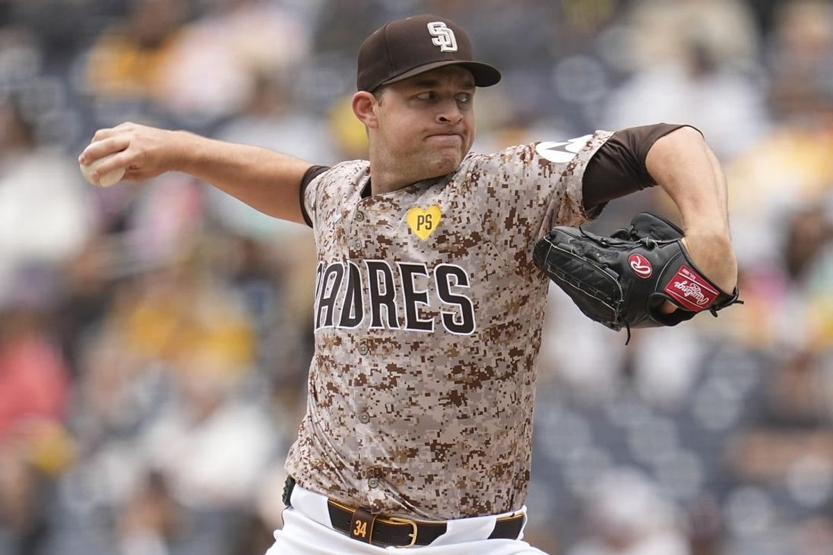 Mar 31, 2024; San Diego, California, USA; San Diego Padres starting pitcher Michael King (34) throws a pitch against the San Francisco Giants during the first inning at Petco Park.