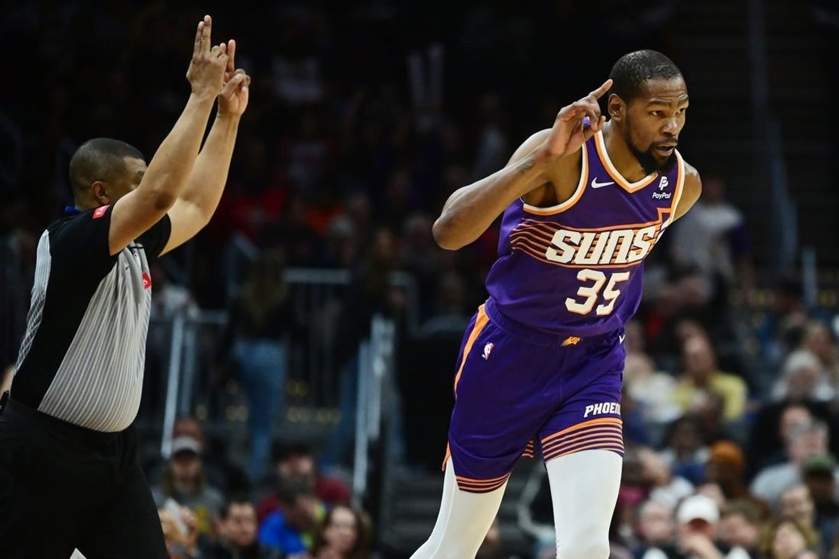 Mar 11, 2024; Cleveland, Ohio, USA; Phoenix Suns forward Kevin Durant (35) celebrates after hitting a three point basket during the second half against the Cleveland Cavaliers at Rocket Mortgage FieldHouse.